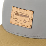 Load image into Gallery viewer, Close up view of leather patch with VW bus and surf board on it
