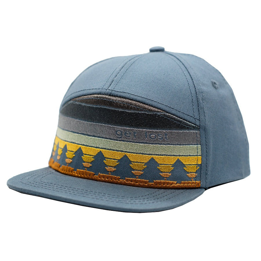 Get lost embroidered woodsy kids hat for hikers, outdoor-lovers, and just cool kids. Subtle sunset design with pine trees on a slate blue flat brim children's cap.