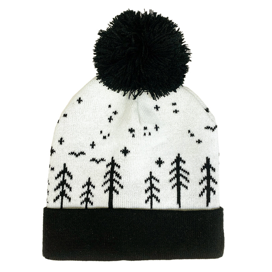 Black and white Winter beanie for kids with pine trees and moon design. Neutral clothes for kids.