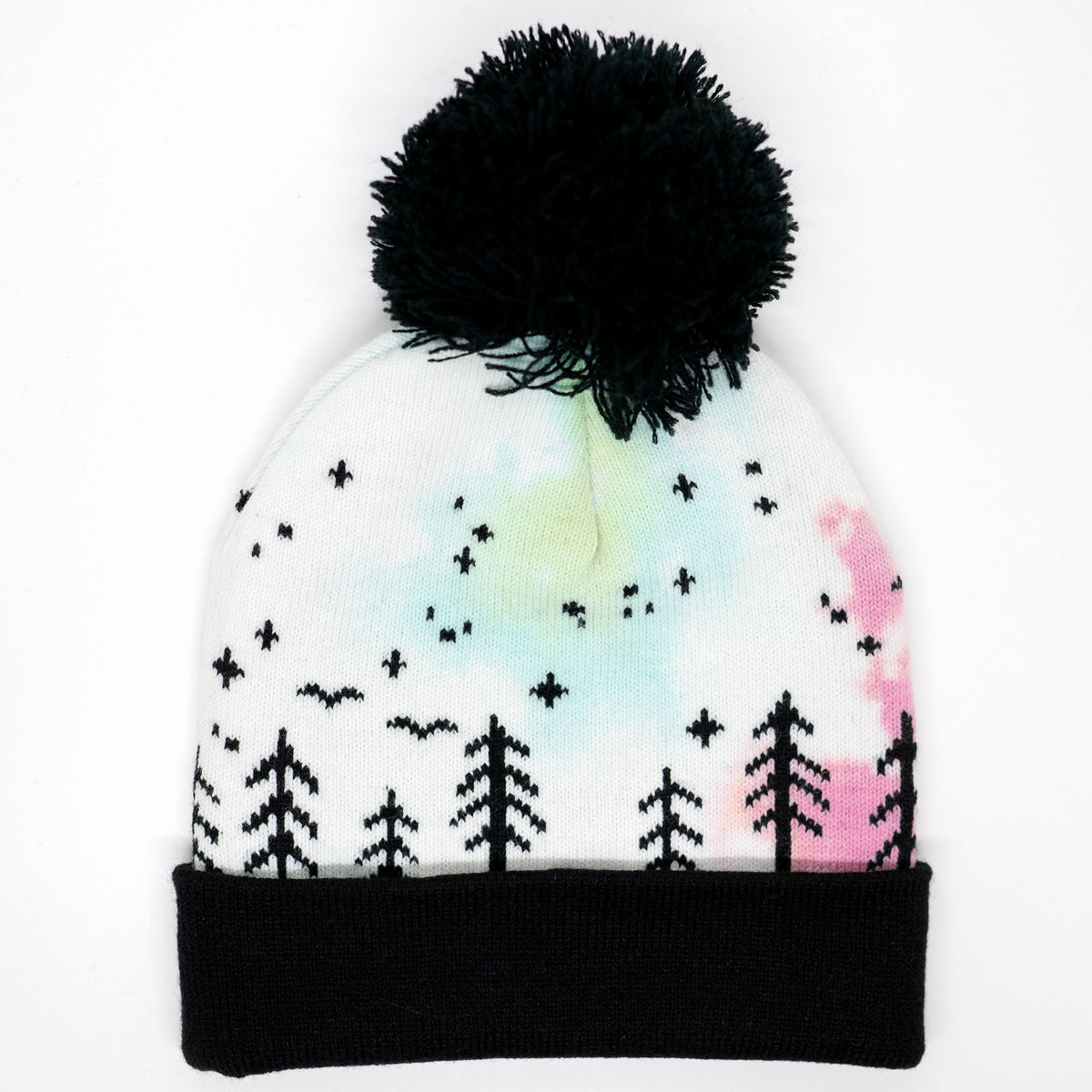 Hand-dyed pink, yellow, blue, and purple kids winter beanie with black pom-pom, folded cuff, pine trees, moon and stars.