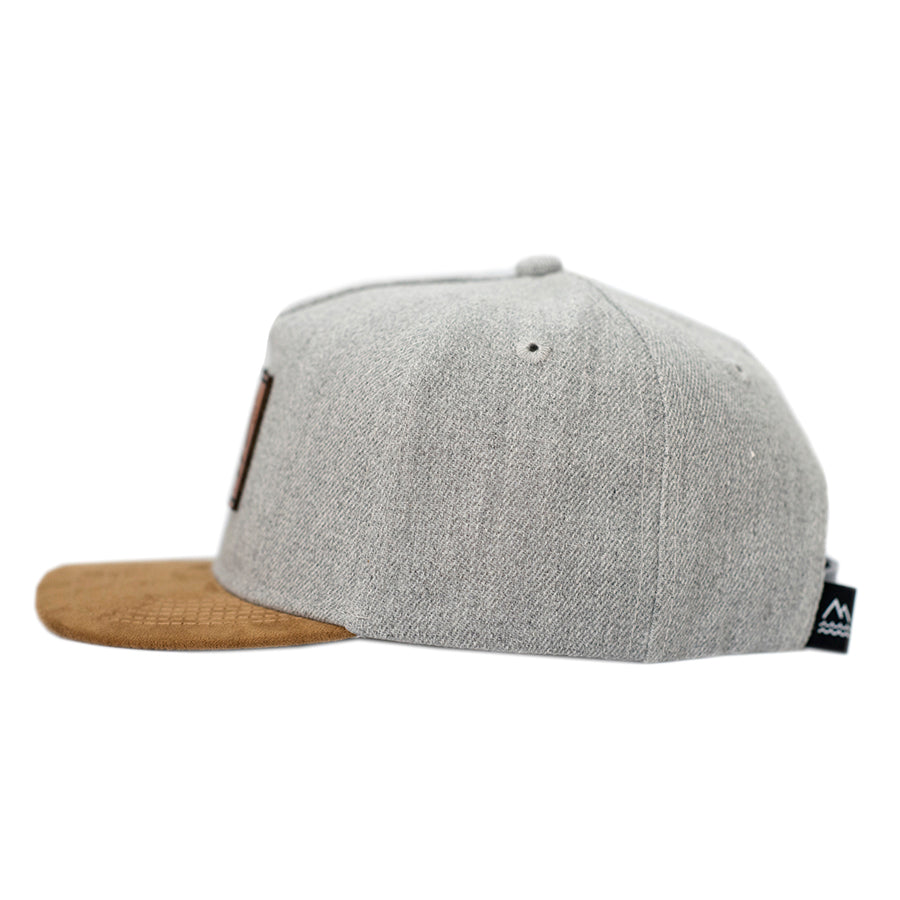 All Good Things Are Wild and Free hats for kids. Heather Grey kids hat with a brown suede flat brim.