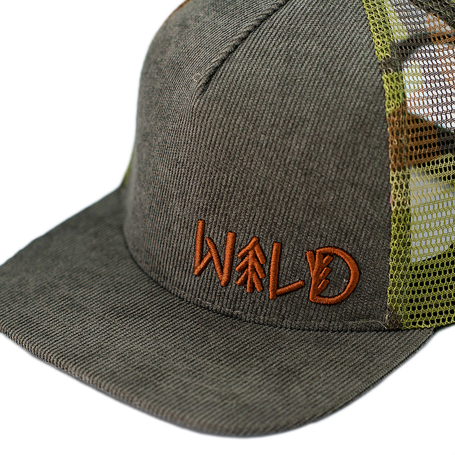 Buck wild kids camo hat with a flat bill. Great for outdoor lovers and those special mountain hikes. Gray corduroy on the front with a burnt orange "Wild" 3D embroidered on the front left side with a mesh trucker style camouflage print on the back.