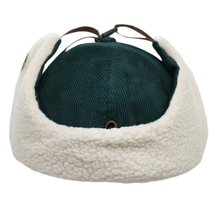 Winter flap hat for children with blue corduroy and a fleece lining.