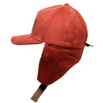 Load image into Gallery viewer, A cross between burnt orange and tomato red, our Zion Wooly children&#39;s flap hat is sure to keep your kids warm and stylish this winter. Our kid&#39;s winter trapper hats are fully lined with soft white fleece, warm corduroy outer shell, and a curved brim to keep the snow or winter sun off of their faces. Best yet, they have a pull cord on the back to customize your fit. Wear them clipped up or down, just be sure to get one for your winter adventures!
